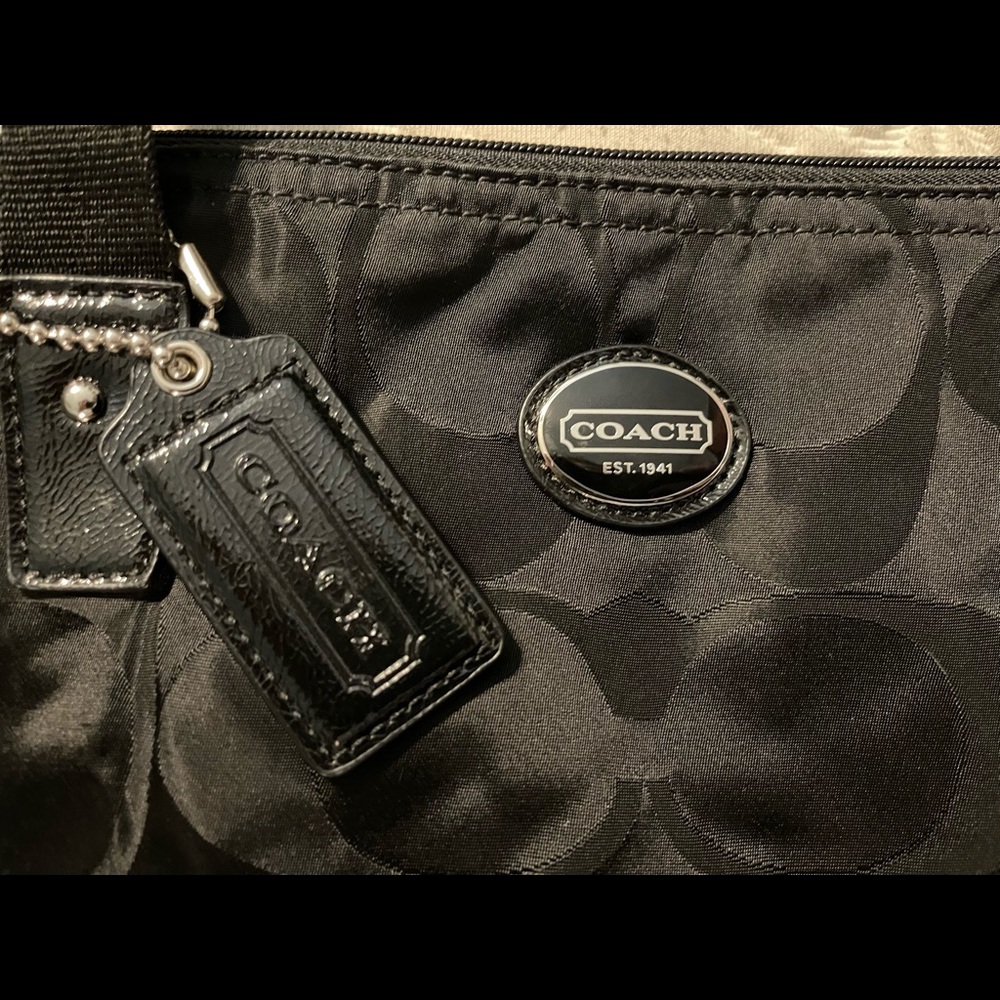 Coach black weekender tote bag